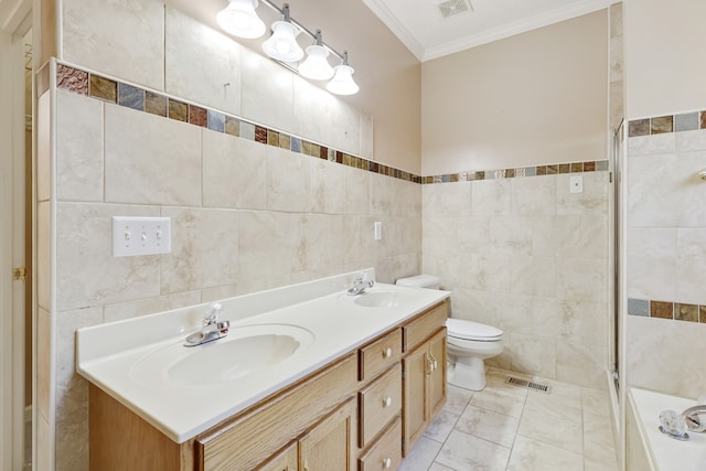 full bathroom with vanity, tile walls, and toilet