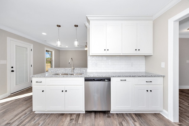 kitchen featuring white cabinetry, ornamental molding, dishwasher, light hardwood / wood-style floors, and sink