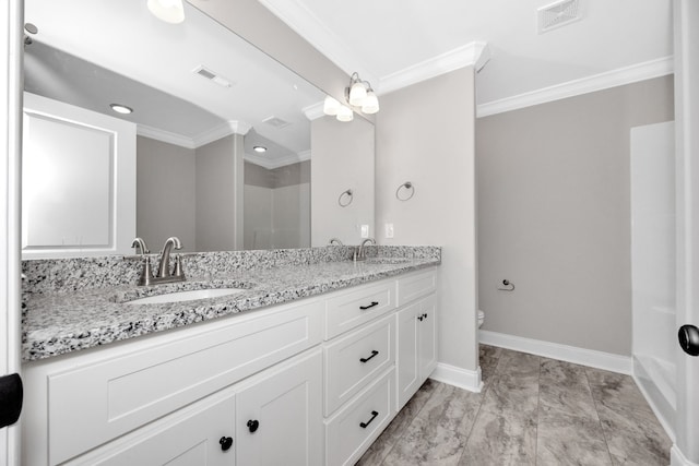 bathroom featuring vanity, crown molding, toilet, and walk in shower