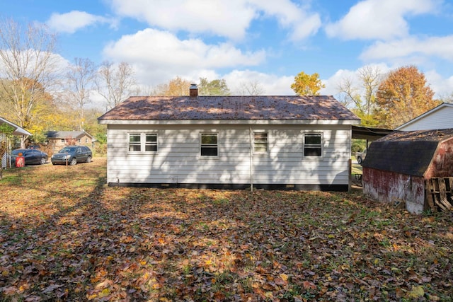 122 Shelton St, Linden, TN 37096 - rear view of house with a chimney