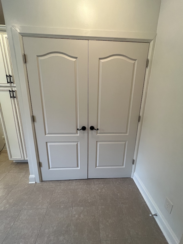 details featuring tile patterned floors