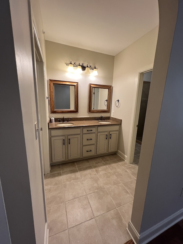 bathroom featuring vanity and tile patterned flooring