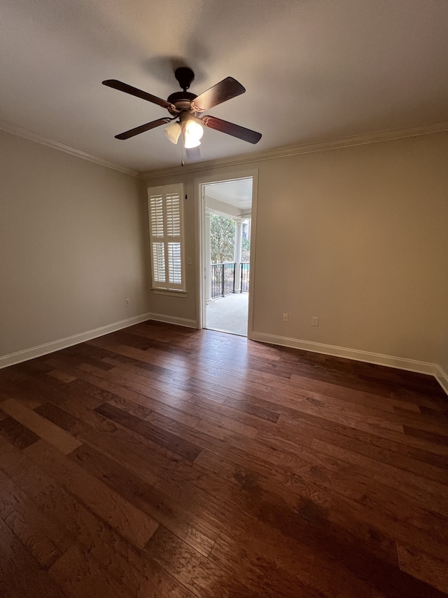 spare room featuring ceiling fan, ornamental molding, and dark hardwood / wood-style flooring