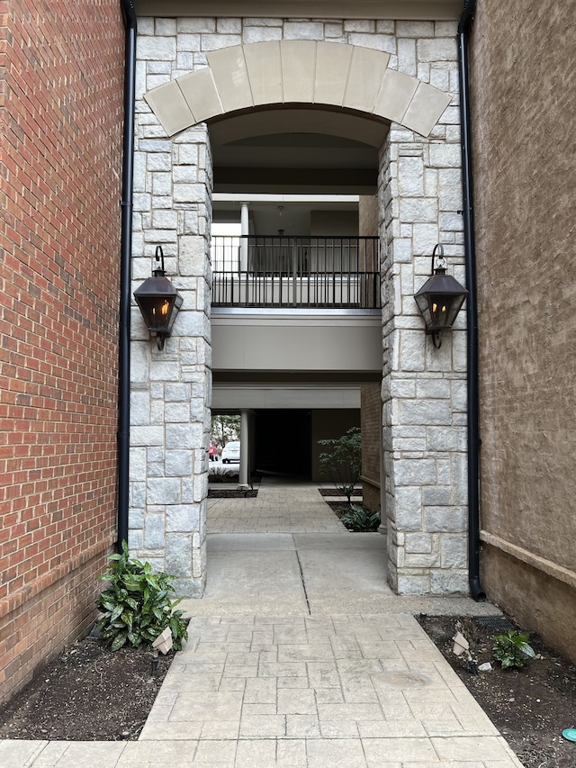 property entrance with a balcony