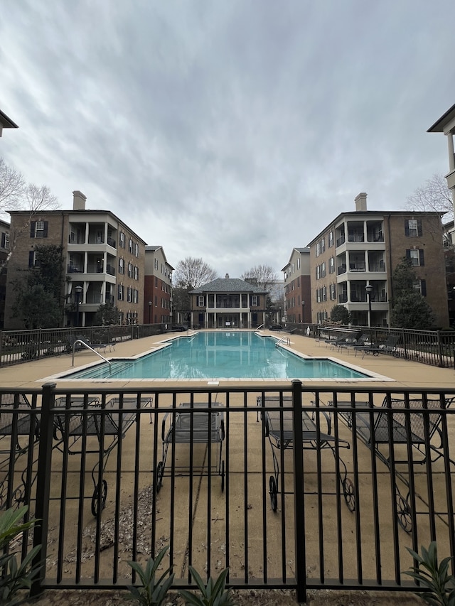 view of pool featuring a patio area