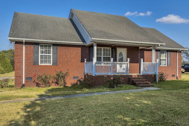 view of front facade featuring a front yard and covered porch