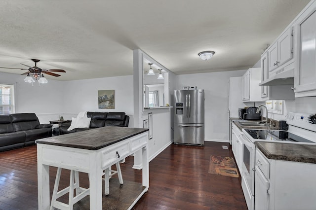 kitchen featuring sink, dark hardwood / wood-style flooring, white range with electric cooktop, white cabinets, and stainless steel fridge with ice dispenser