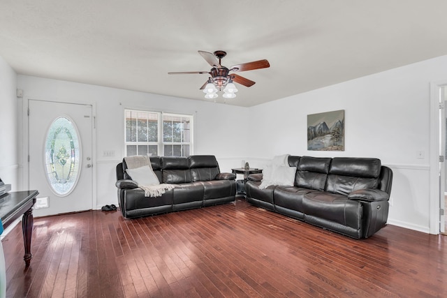 living room with dark hardwood / wood-style floors and ceiling fan