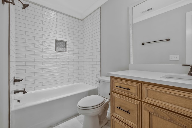 full bathroom with vanity, toilet, and tiled shower / bath