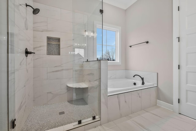 2120 Hamilton Chambers Rd, Lebanon, TN 37087 - bathroom featuring a shower stall, a garden tub, and baseboards