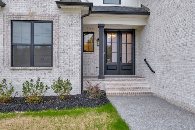 entrance to property featuring french doors