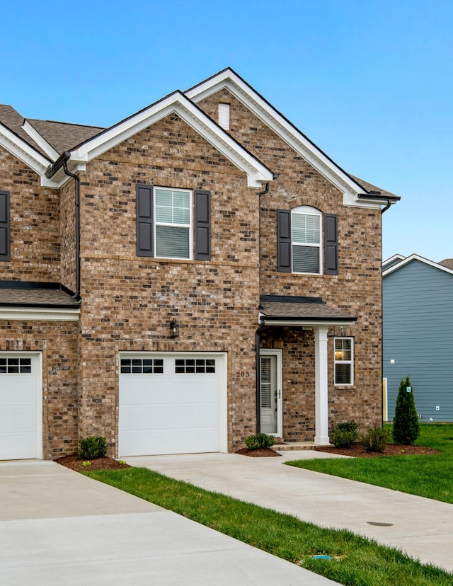 view of front of home with a garage