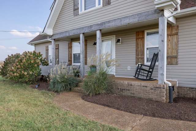 property entrance featuring covered porch