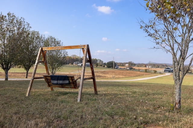 view of play area featuring a yard