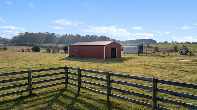 exterior space featuring a shed and a rural view