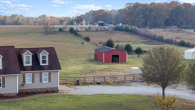 birds eye view of property featuring a rural view