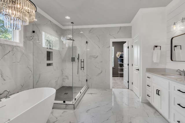 bathroom with vanity, ornamental molding, a chandelier, and plus walk in shower