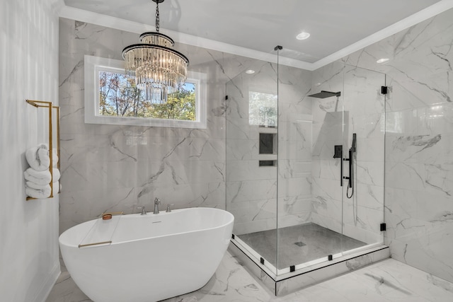 bathroom with tile walls, a chandelier, separate shower and tub, and ornamental molding