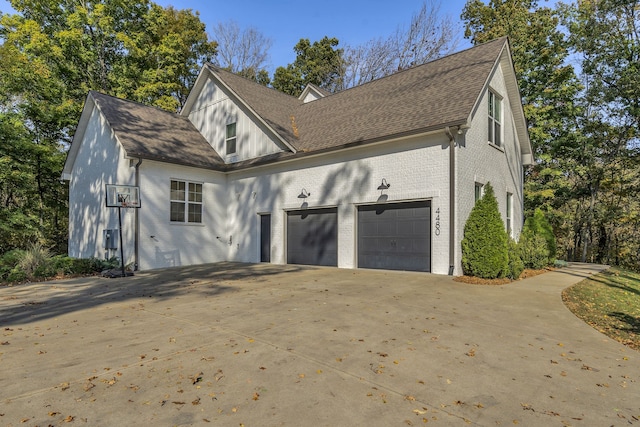 view of property exterior featuring a garage