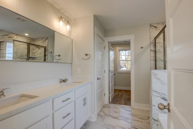 bathroom featuring vanity and walk in shower