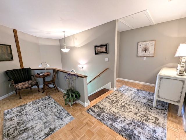 sitting room with light parquet flooring