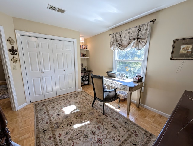 office space featuring light parquet floors