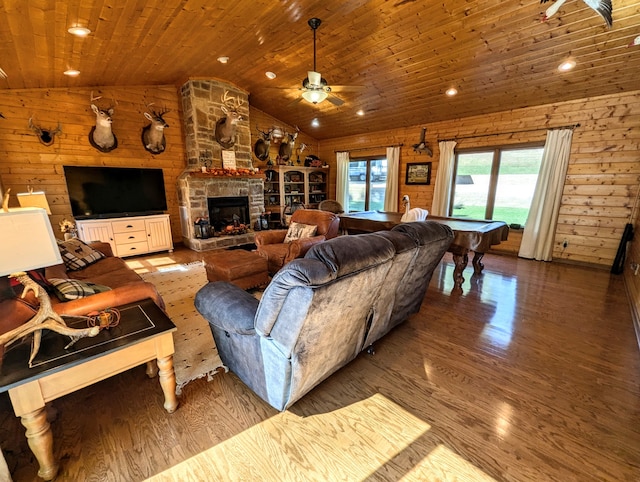 living room with wooden walls, wood ceiling, vaulted ceiling, and light wood-type flooring