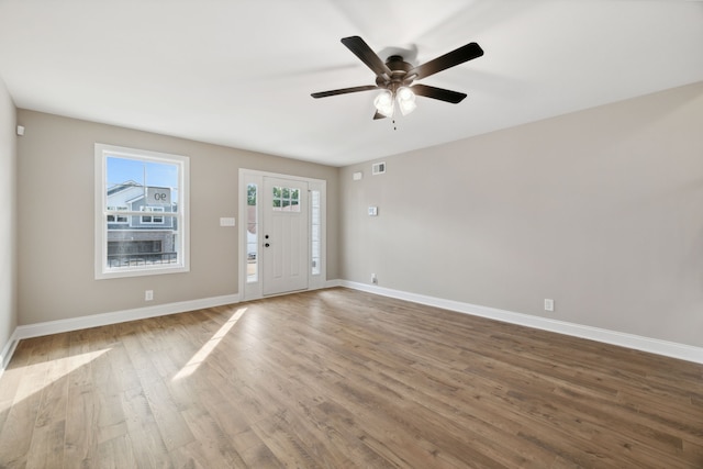 interior space with hardwood / wood-style flooring and ceiling fan