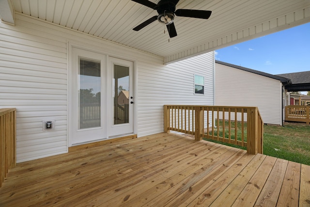 wooden deck with ceiling fan