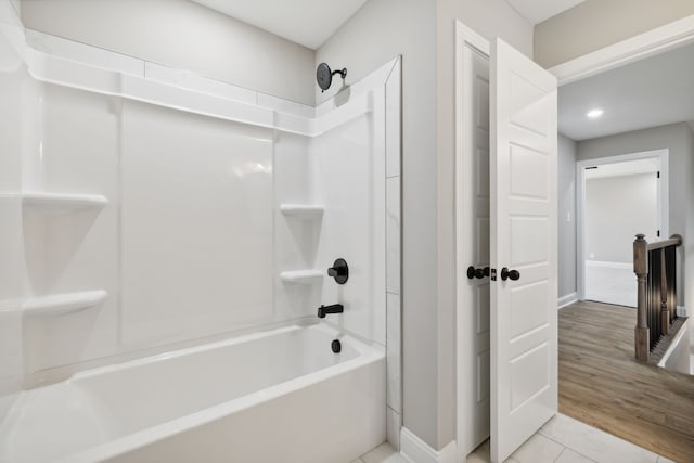 bathroom with  shower combination and hardwood / wood-style flooring