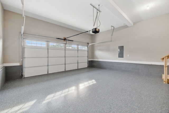 garage featuring electric panel and a garage door opener