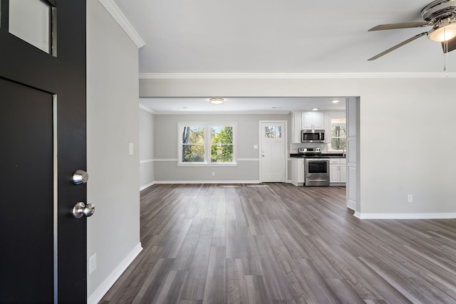 unfurnished living room featuring ornamental molding, hardwood / wood-style floors, and ceiling fan