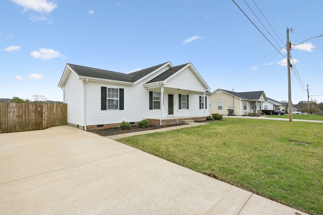 ranch-style house featuring a front yard and a porch