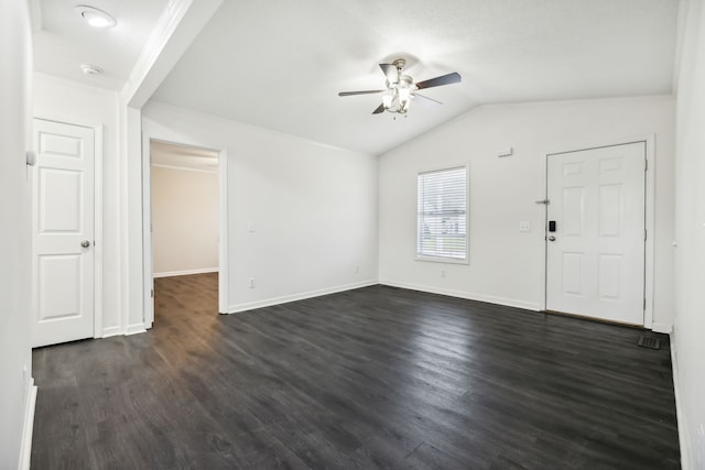 interior space with ceiling fan, dark hardwood / wood-style flooring, and lofted ceiling