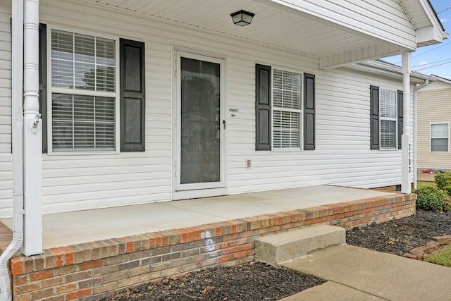 entrance to property with a porch