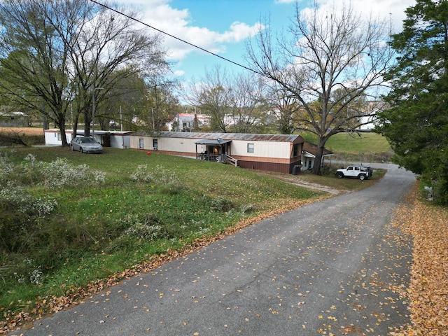 exterior space with a front yard