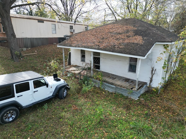 302 S Walnut St, Linden, TN 37096 - view of front of house featuring a porch and roof with shingles