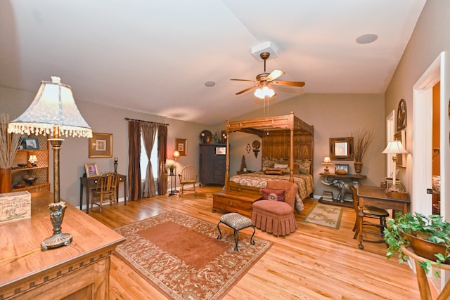 bedroom featuring light hardwood / wood-style floors and vaulted ceiling