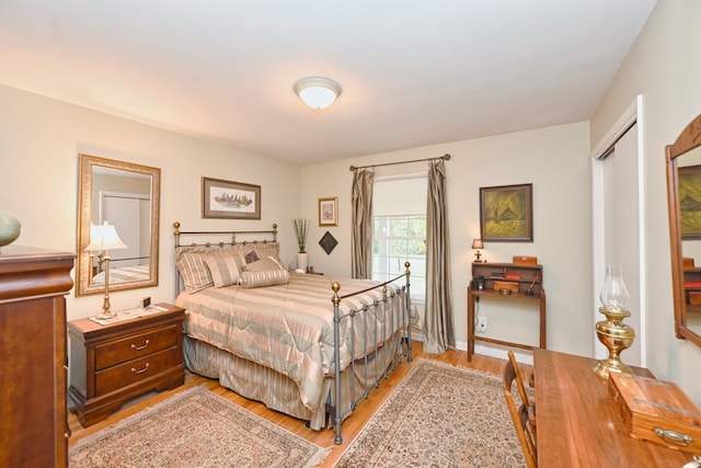 bedroom featuring light wood-type flooring