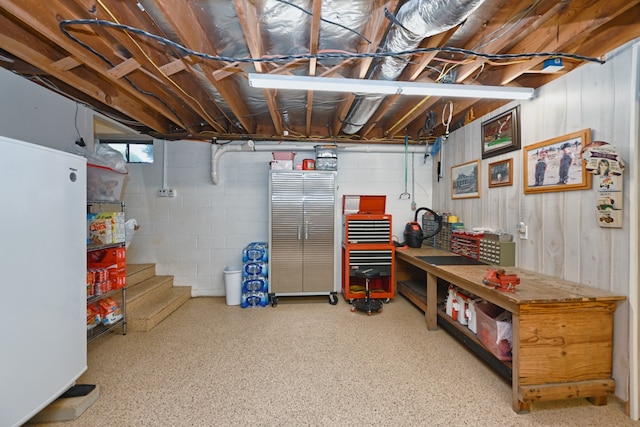 basement with a workshop area