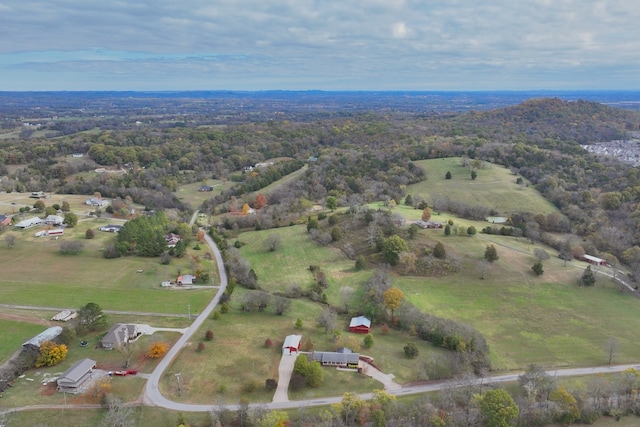 birds eye view of property featuring a rural view