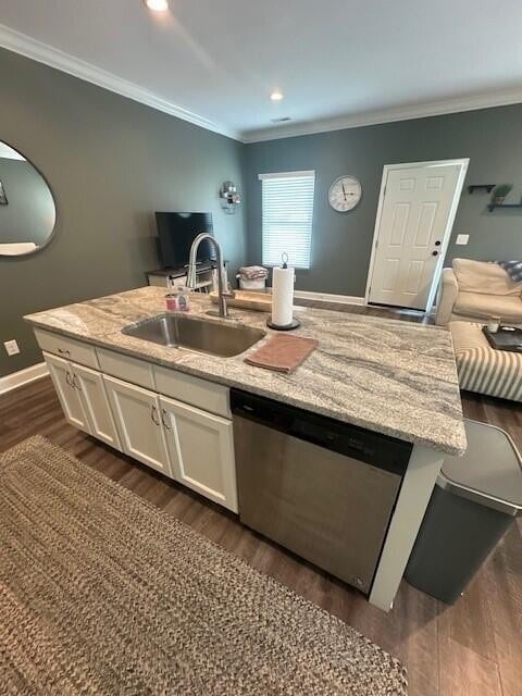 kitchen featuring white cabinetry, stainless steel dishwasher, ornamental molding, dark wood-type flooring, and sink