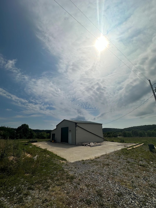 view of outdoor structure featuring a garage