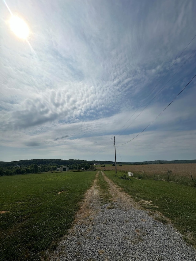 view of street featuring a rural view