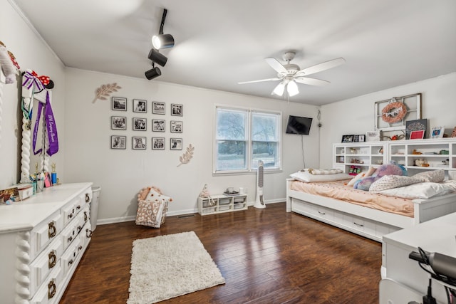 bedroom featuring dark hardwood / wood-style floors and ceiling fan