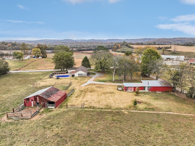 bird's eye view featuring a rural view and a mountain view