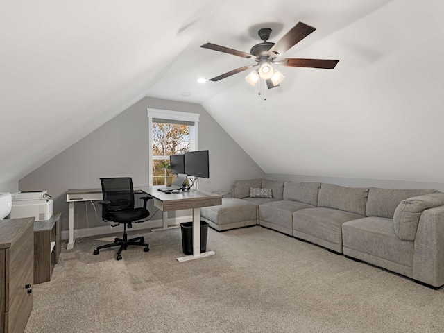 office space with ceiling fan, light colored carpet, and lofted ceiling