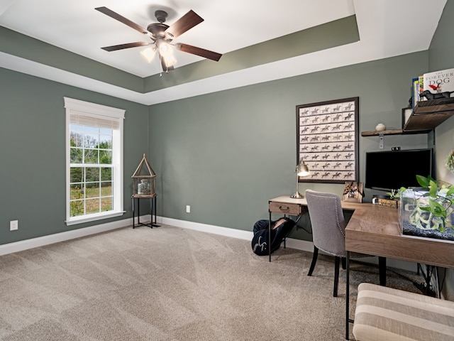 office area featuring ceiling fan and light carpet