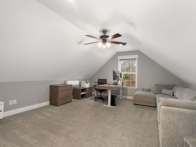 office area with carpet, ceiling fan, and lofted ceiling