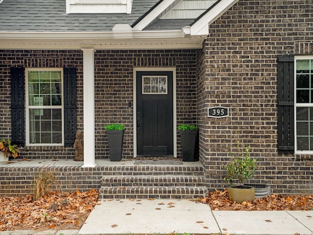 property entrance featuring covered porch